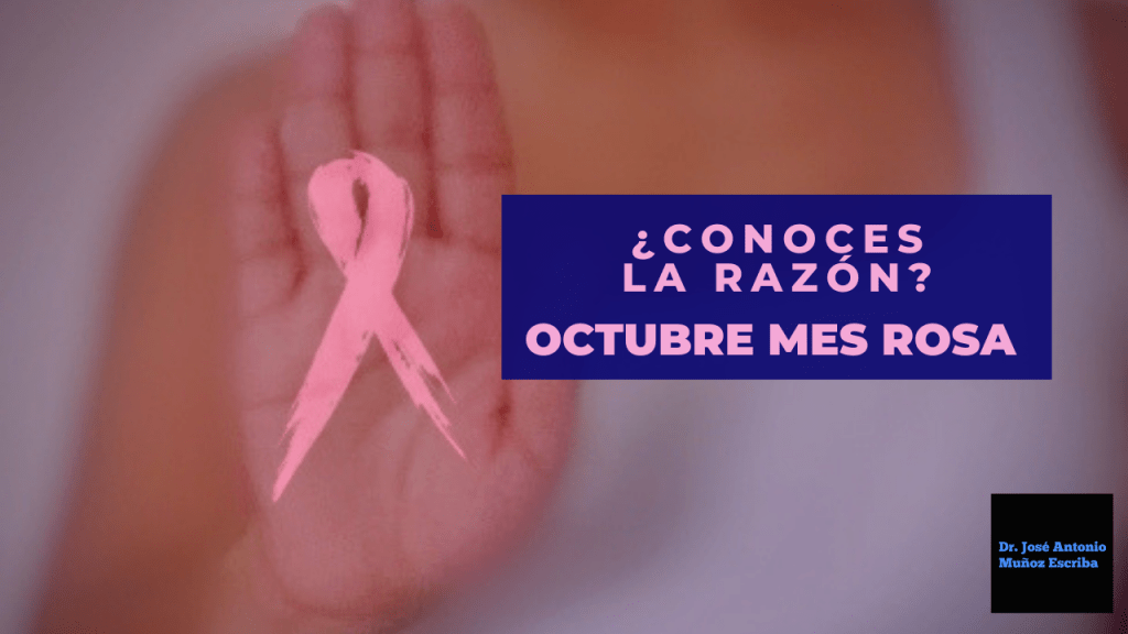 Mujer con la mano derecha al frente mostrando la palma en la que se ve el lazo rosado, símbolo de la lucha del cáncer de mama